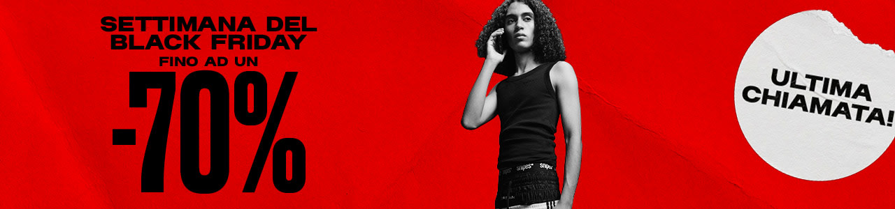 black & white image of model wearing streetwear clothing standing in front of red back ground with text: Black week up to -70%, last call