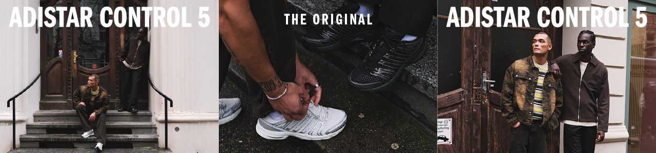 male models wearing adidas control white sneakers on a street in a city background