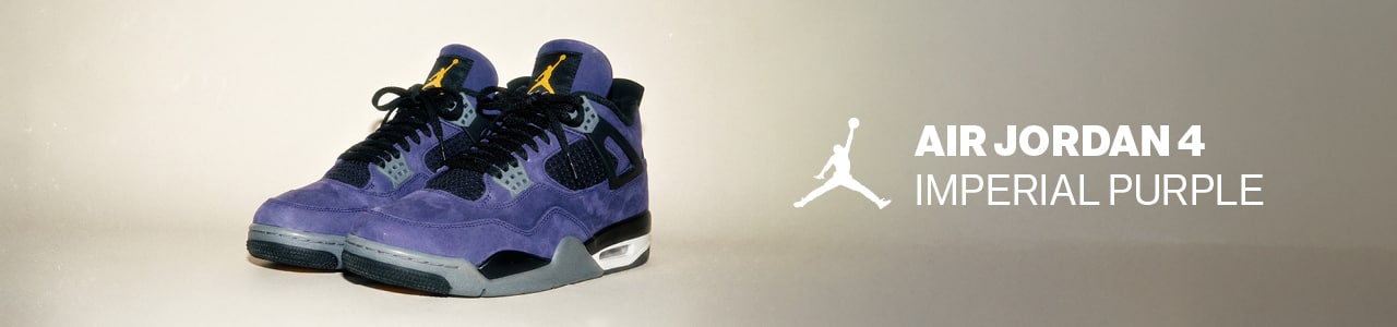 A product showcase of the Air Jordan 4 "Imperial Purple" sneakers. The shoes feature a premium deep purple suede upper, contrasted by black mesh netting on the side panels and tongue. The design includes grey lace eyelets, black laces, and a visible Air-sole unit in the white and black midsole. A signature gold Jumpman logo is prominent on the tongue. The background is a neutral, minimalist cream gradient, accompanied by the Jumpman logo and the text "AIR JORDAN 4 IMPERIAL PURPLE" in a clean, white sans-serif font.