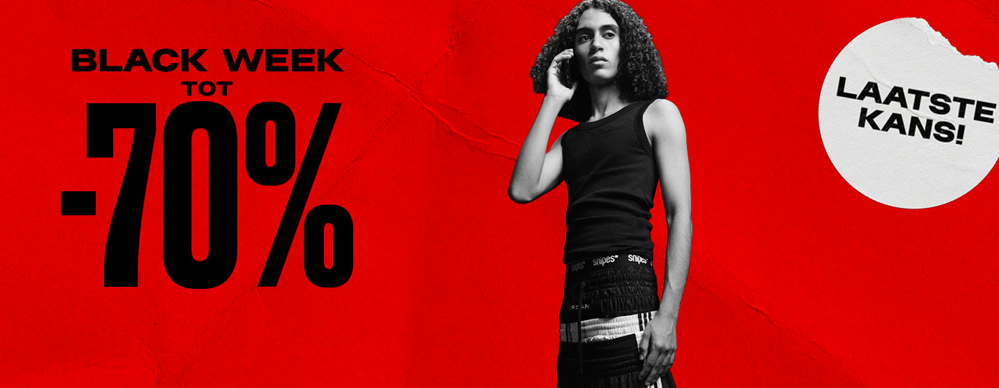 black & white image of model wearing streetwear clothing standing in front of red back ground with text: Black week up to -70%, last call