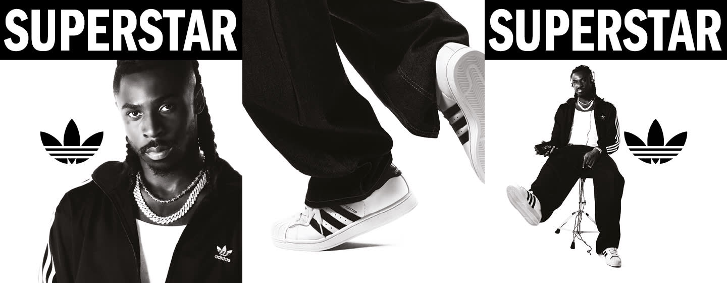 black and white image of athlete Moise Kean wearing black adidas Superstar II sneakers and black adidas tracksuit