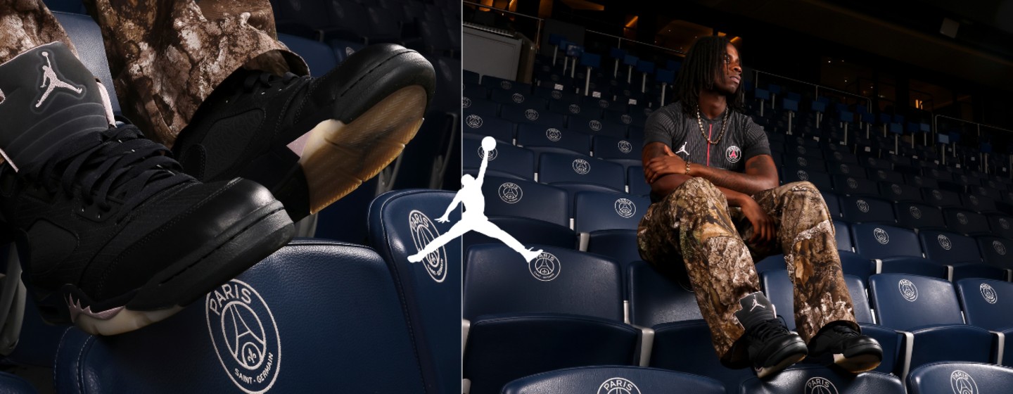 Jordan PSG Black sneakers and male model wearing PSG 4th Jersey and Jordan camo pants