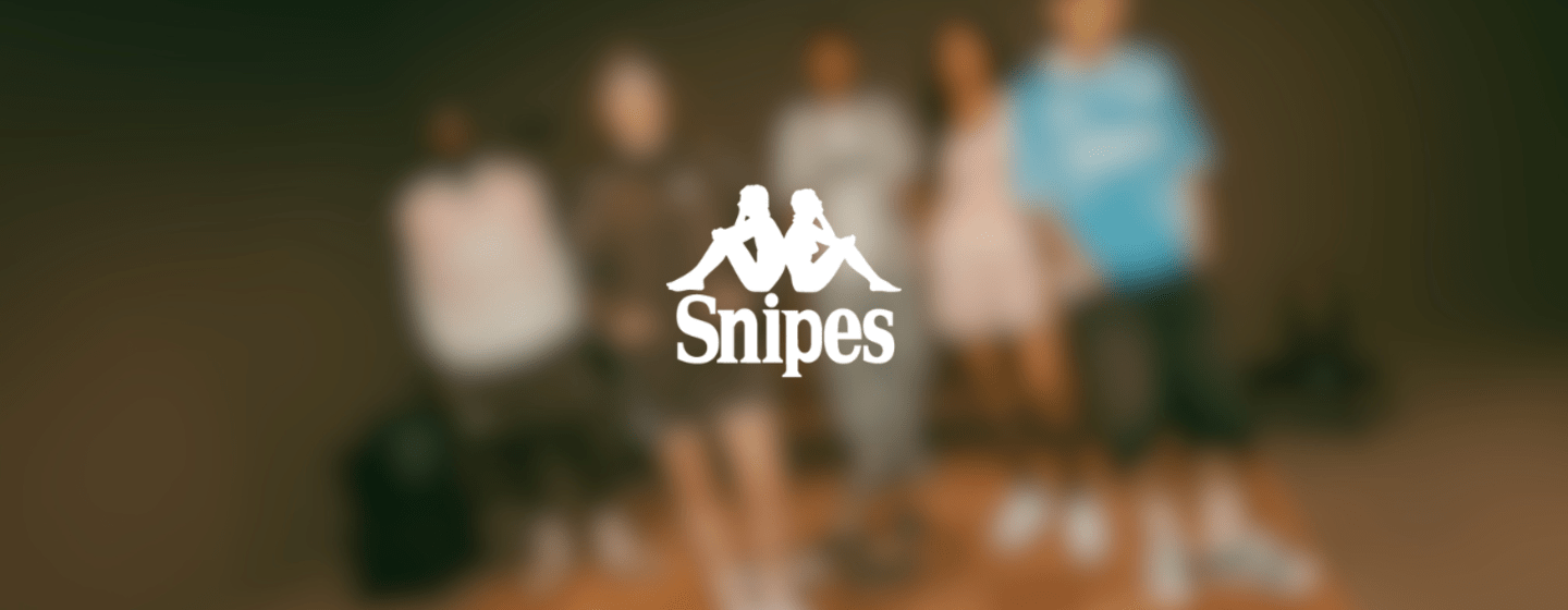 Snipes x Kappa logo over a blurred background