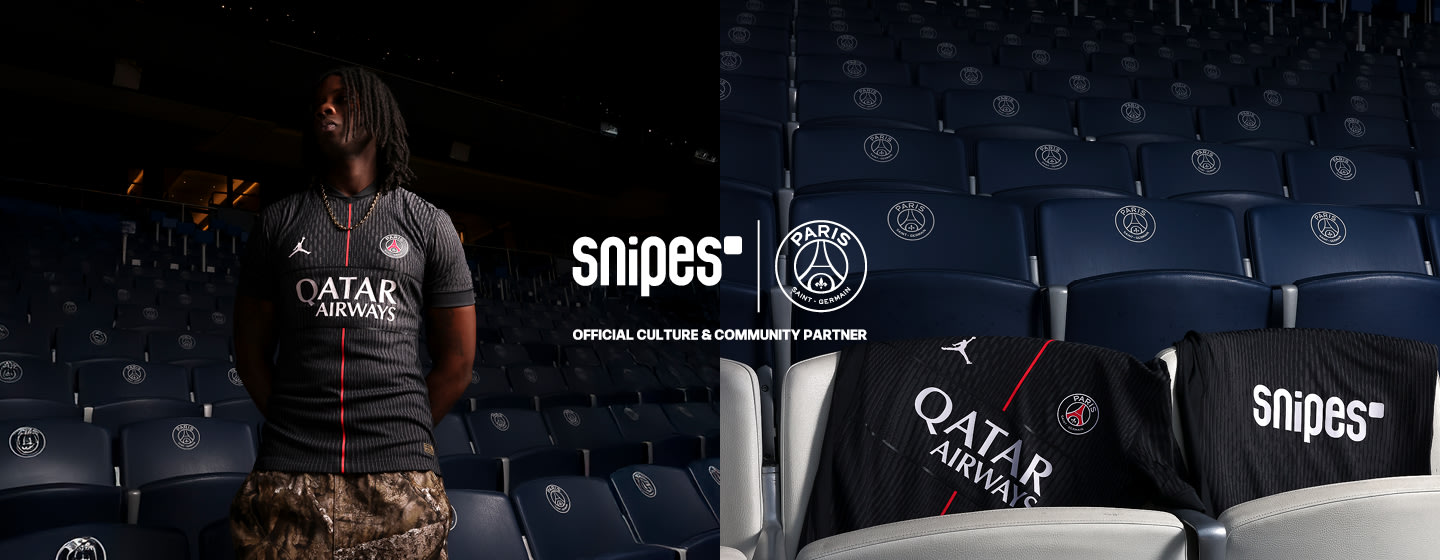 models standing the PSG football stadion while wearing the Jordan PSG 4th Jersey