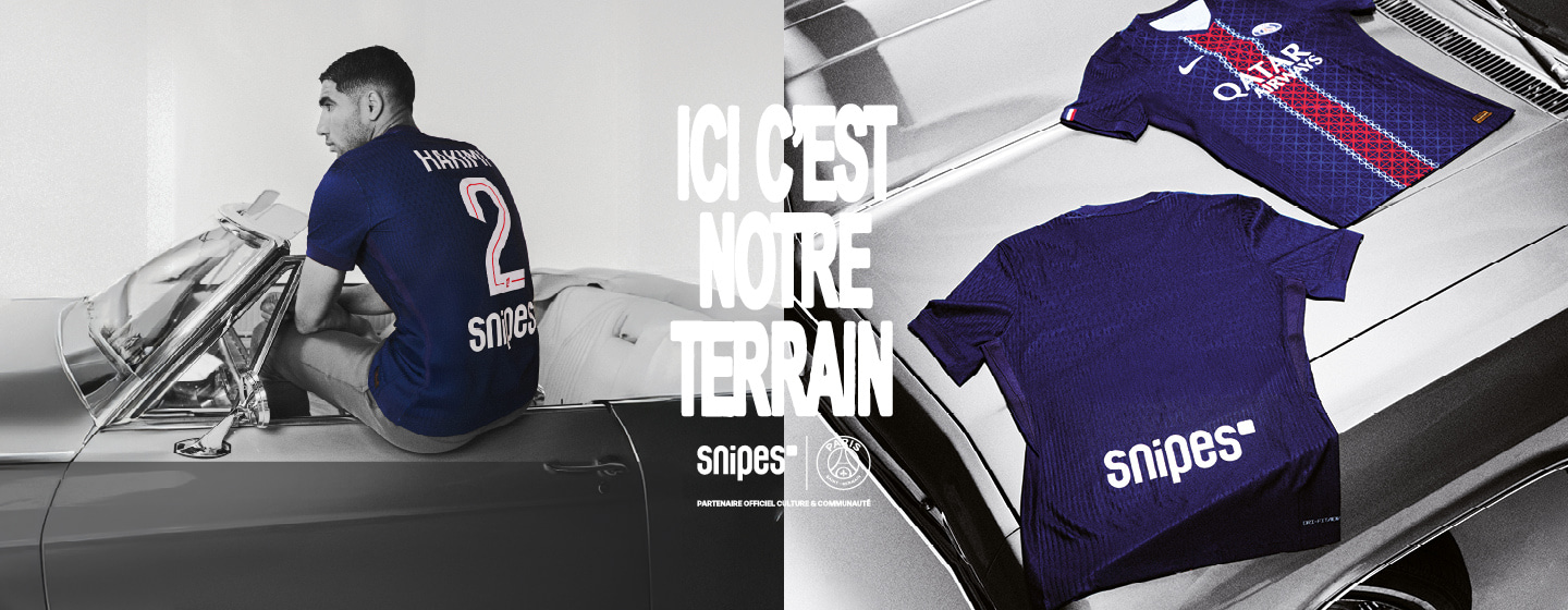 Promotional image featuring Paris Saint-Germain (PSG) football jerseys in collaboration with Snipes. On the left, a man wearing a blue PSG jersey with the name 'Hakimi' and number 2 sits in a vintage convertible car. On the right, two PSG jerseys are displayed on the car hood—one showing the front with Qatar Airways sponsor logo, and the other showing the back with the Snipes logo. Bold white text in the center reads 'ICI C’EST NOTRE TERRAIN' (This is our field).