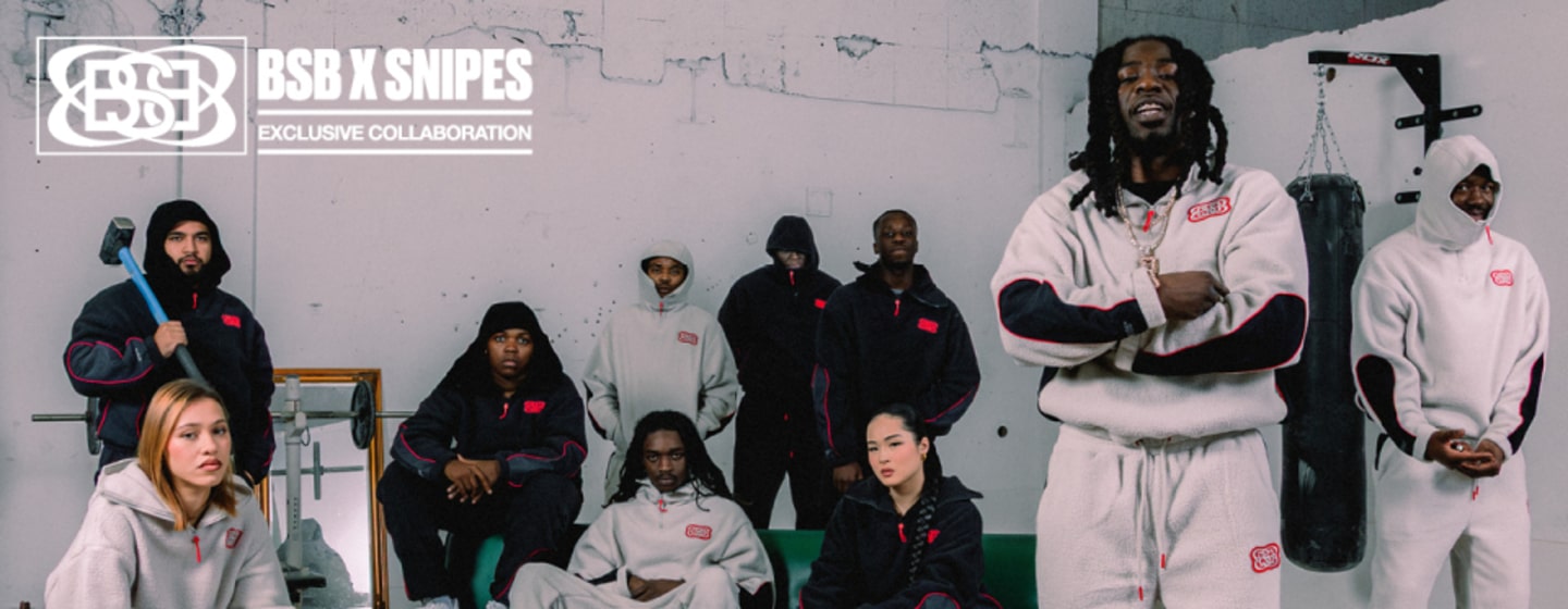 group of people wearing the new BSB x Snipes collection of grey and black sweatjackets and sweatpants.  White logo on the image BSB x Snipes Exclusive Collection