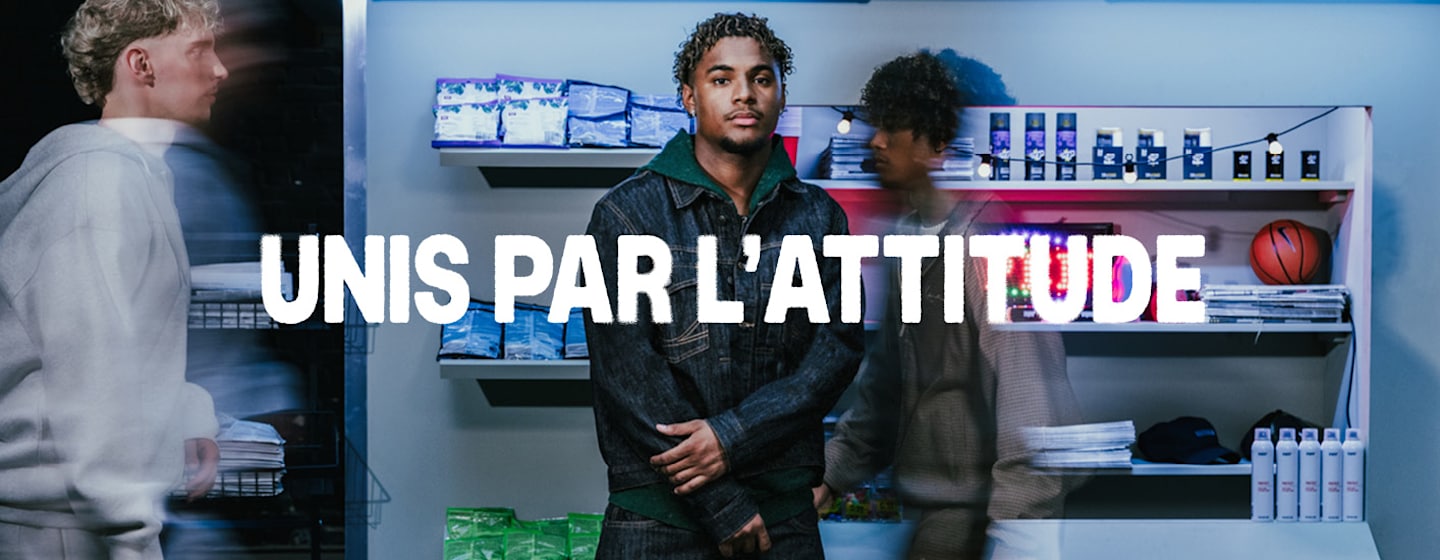 models in the background and United by Attitude claim in a white font in the middle of the image
