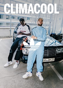 Campaign for Climacool in a stweet focusing on atwo guys wearing sporty clothing and climacool sneakers