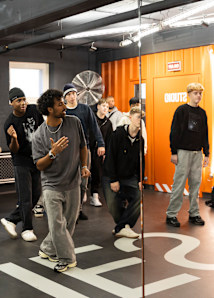 Photo of young students taking a hiphop dance class at the snipes hiphop studio