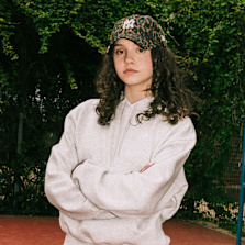 Kid wearing sporty clothes for a back to school campaign
