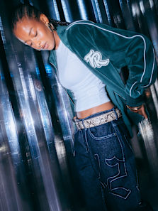 Models wearing autumn streetwear clothing, while standing in a silver futuristic setting. Text on the image says "Got it from snipes"