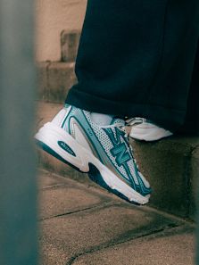 White and blue New Balance sneakers 