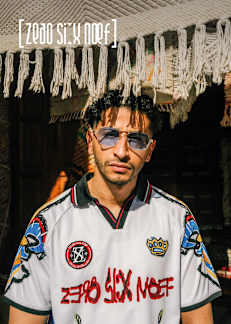 Man wearing zero six neuf t-shirt