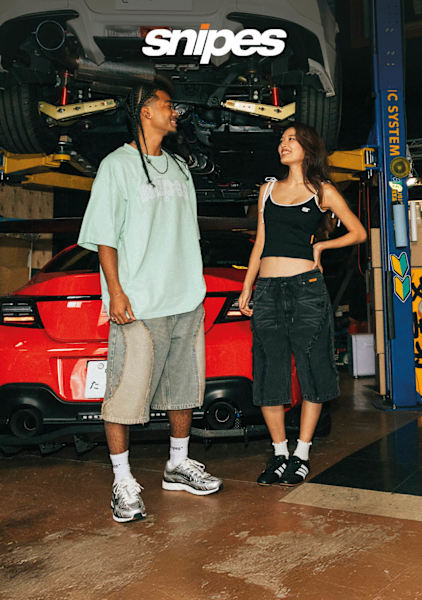 Men and woman dressed with snipes concept clothing with the wording snipes 