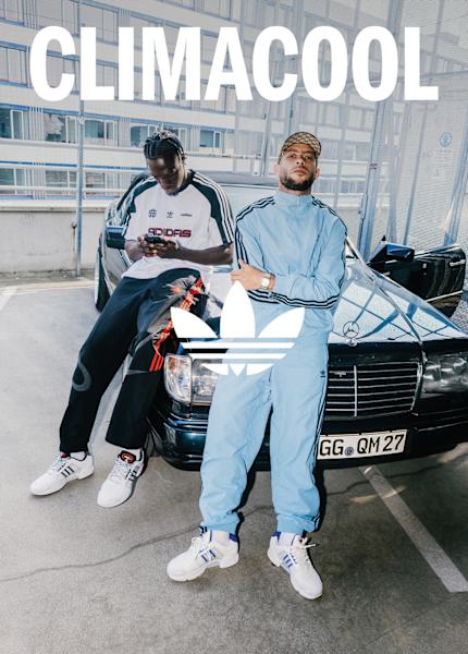 Campaign for Climacool in a stweet focusing on atwo guys wearing sporty clothing and climacool sneakers