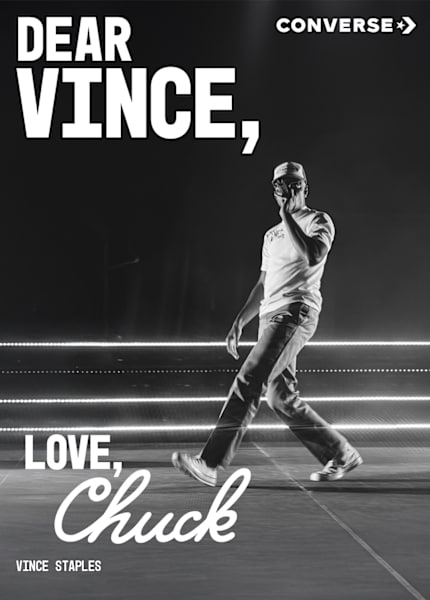 Vince in black and white walking with the wordings 'Dear Vince, love chuck'