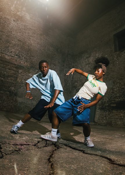 Women and Men dancing in a dance floor wearing clothing from the collab Sprite x SNIPES