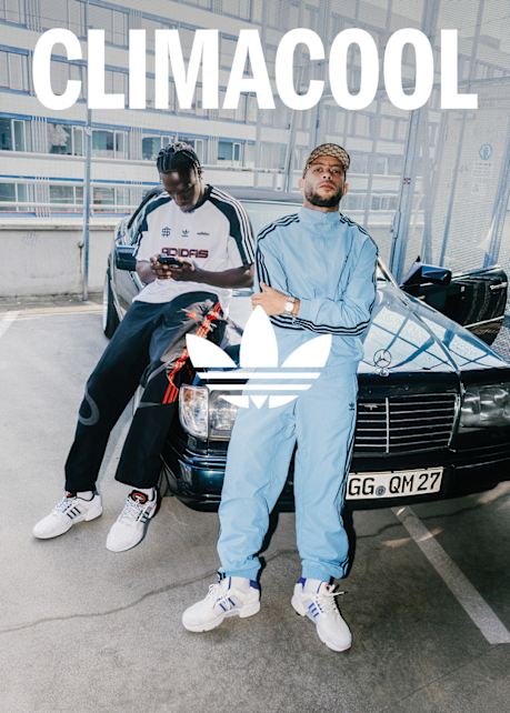 Campaign for Climacool in a stweet focusing on atwo guys wearing sporty clothing and climacool sneakers