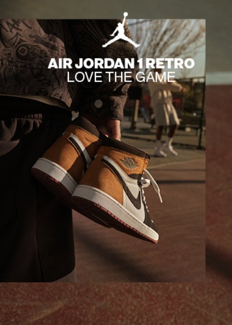 A pair of Air Jordan 1 Retro high-top sneakers in tan leather, off-white panels, and dark brown accents sitting on a outdoor court ground. On the right is the white Jumpman logo alongside the text "AIR JORDAN 1 RETRO LOVE THE GAME." On the left, a inset photo shows someone holding the shoes over their shoulder outdoors.