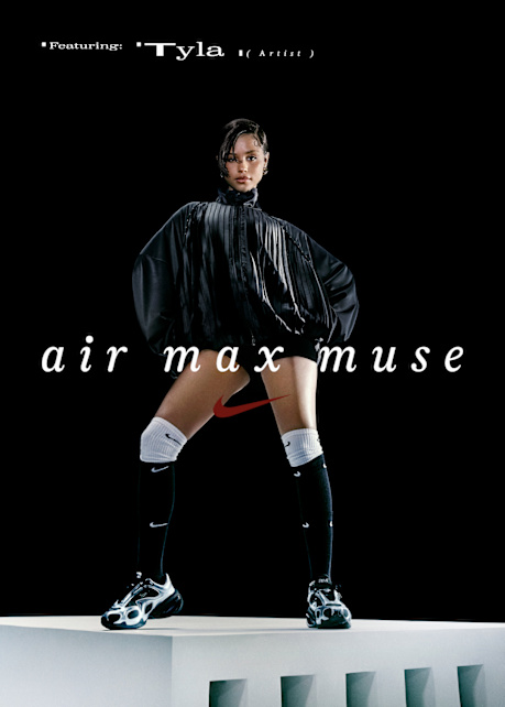 Artist Tyla poses confidently in a Nike ad campaign titled “Air Max Muse.” She wears a black oversized pleated jacket, black and white Nike knee-high socks, and black Nike Air Max sneakers. She stands on a white platform against a black background, with bold white and red text overlaying the image.