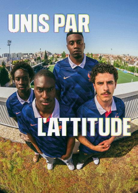 Wide banner featuring three smiling young adults on an urban rooftop, dressed in Nike France soccer apparel. Overlaid on the left and right in large, bold white text with a subtle yellow glow is the French phrase "UNIS PAR L'ATTITUDE". On the left, a man sits in a light-colored jacket with black and red accents. In the center and right, two women sit together wearing blue patterned France national team jerseys with the FFF rooster crest.