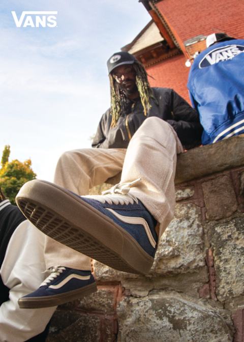 Blue sneaker Vans Old Skool and blue Vans college jacket