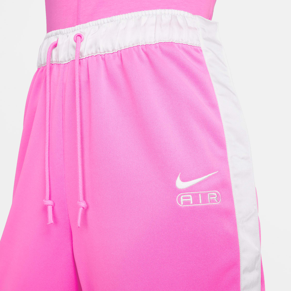 Nike Sportswear Air Mid-Rise Breakaway Pants women Trainingsbroeken lichtroze Maat M Kleding