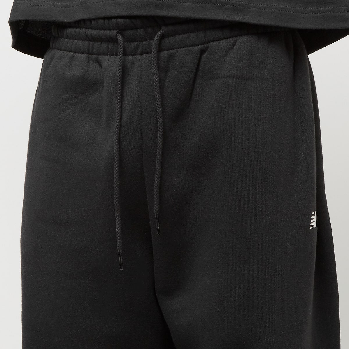 New Balance Fleece Jogger Trainingsbroeken in zwart formaten: M