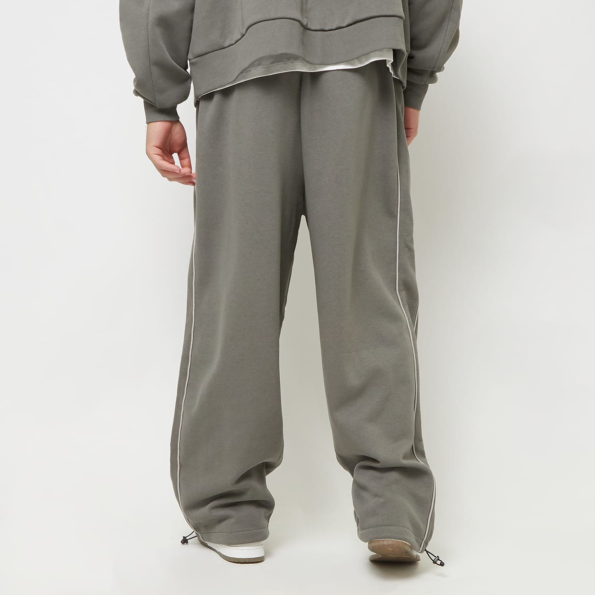 Karl Kani Oversized Sidestripe Sweatpants Trainingsbroeken in grijs formaten: L