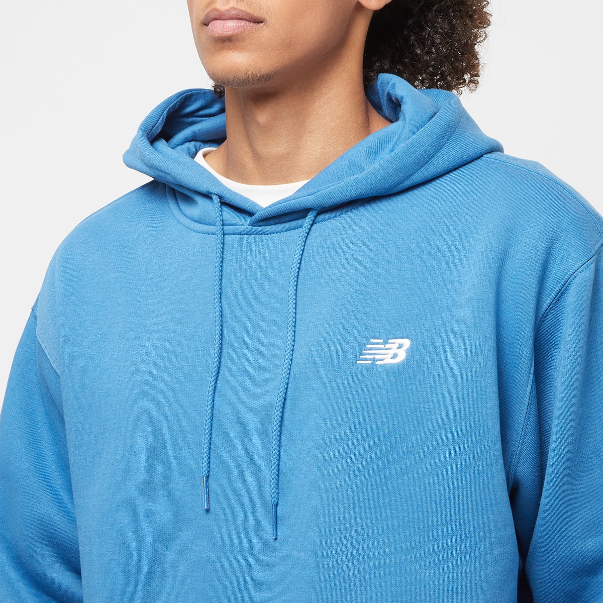 New Balance SPORT ESSENTIALS FLEECE HOODIE blue agate (423) men Hoodies & Sweaters blauw Maat S Kleding