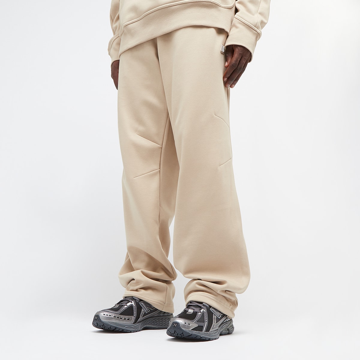 New Balance Hoops Uniform Pants Trainingsbroeken in beige formaten: XL