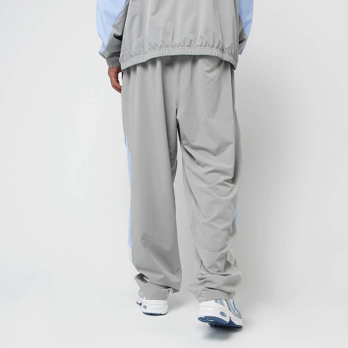 New Balance Woven Track Pant beige men Trainingsbroeken grijs Maat S Kleding