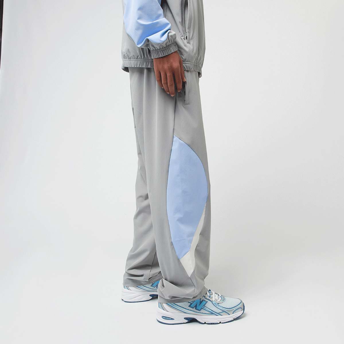 New Balance Woven Track Pant beige men Trainingsbroeken grijs Maat S Kleding