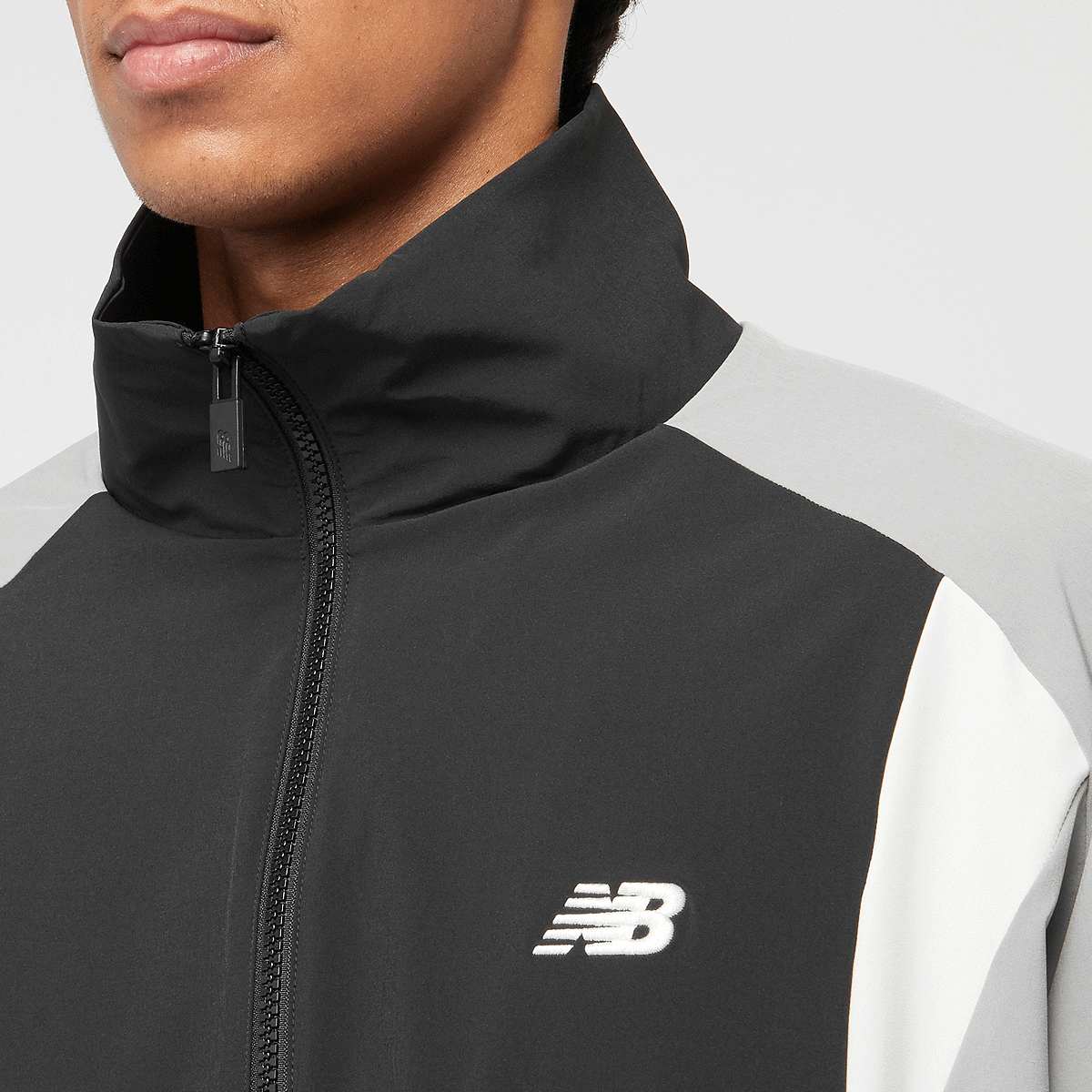 New Balance Woven Track Jacket men Trainingspakken zwart Maat S Kleding