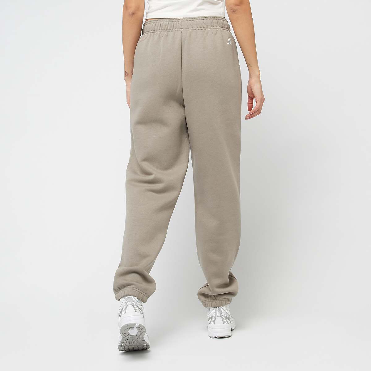 New Balance Linear Fleece Jogger women Trainingsbroeken beige Maat XS Kleding