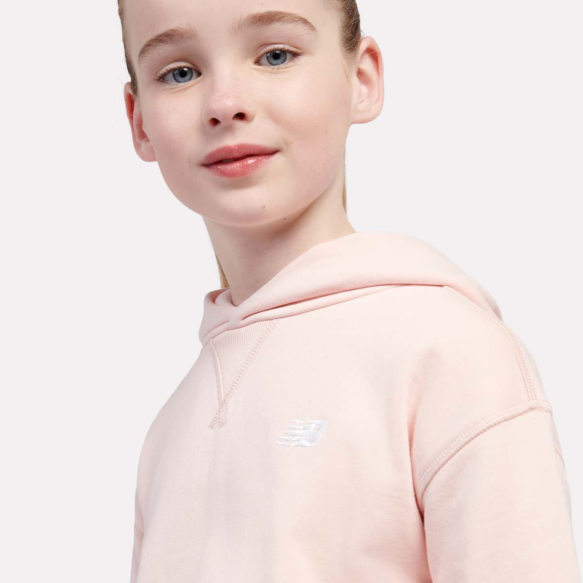 New Balance French Terry Small Logo Hoodie unisex Hoodies & Sweaters lichtroze Kleding