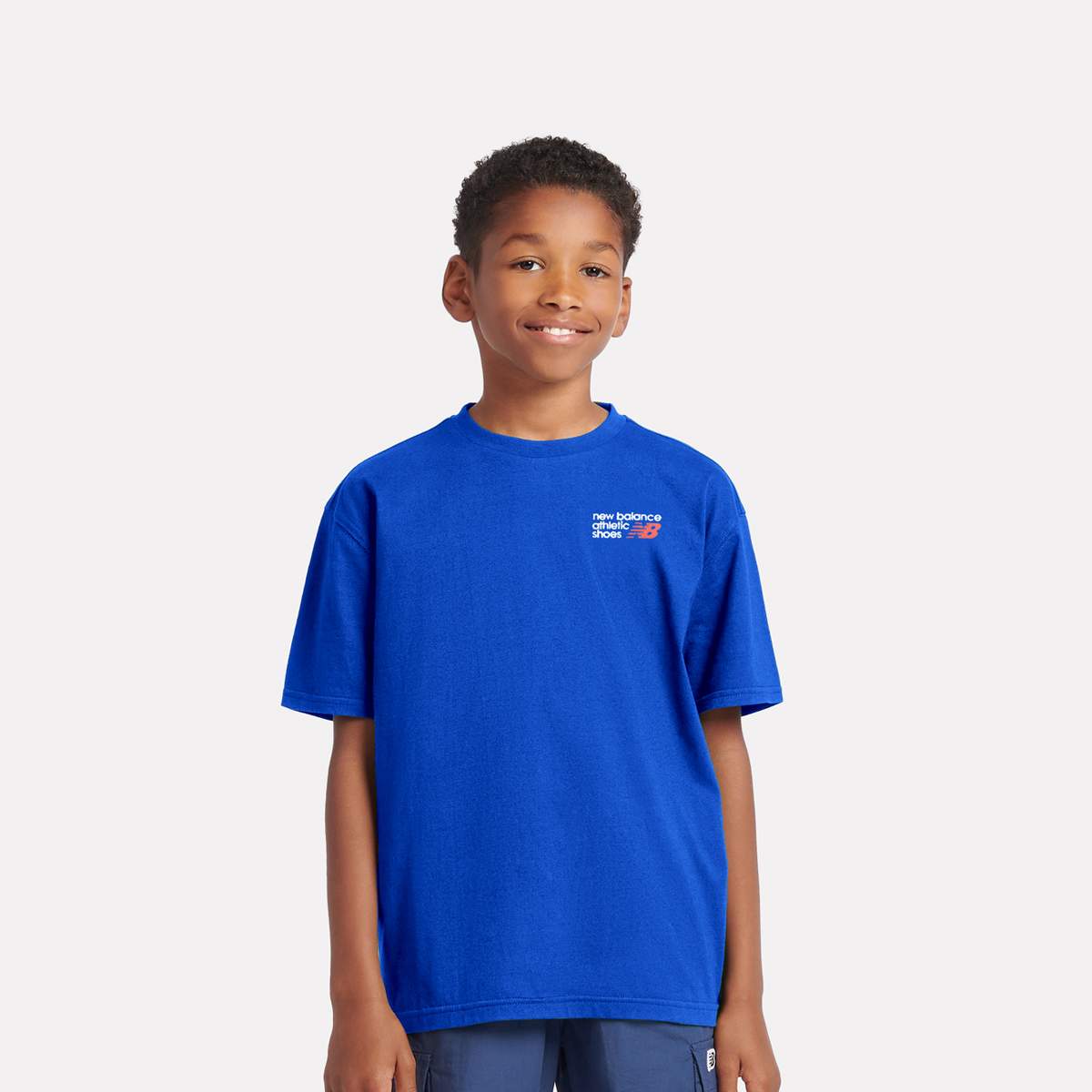 New Balance Athletics Shoes Back Graphic Tee unisex T-Shirts blauw Kleding