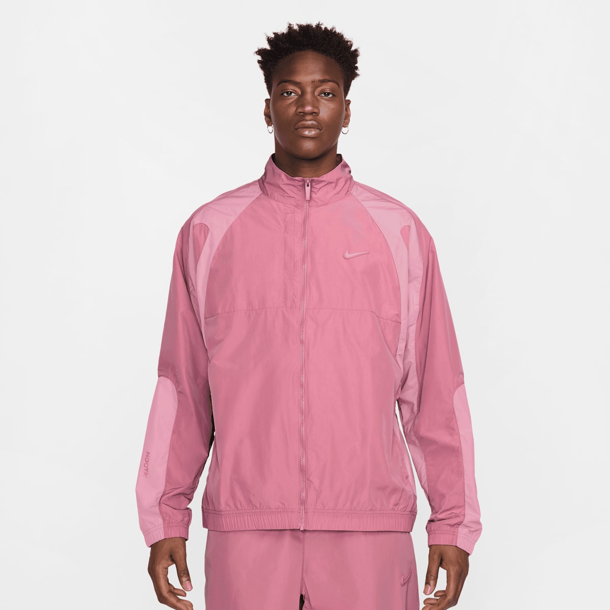 Nike Nocta NRG CS Woven Track Jacket Trainingspakken in lichtroze formaten: L