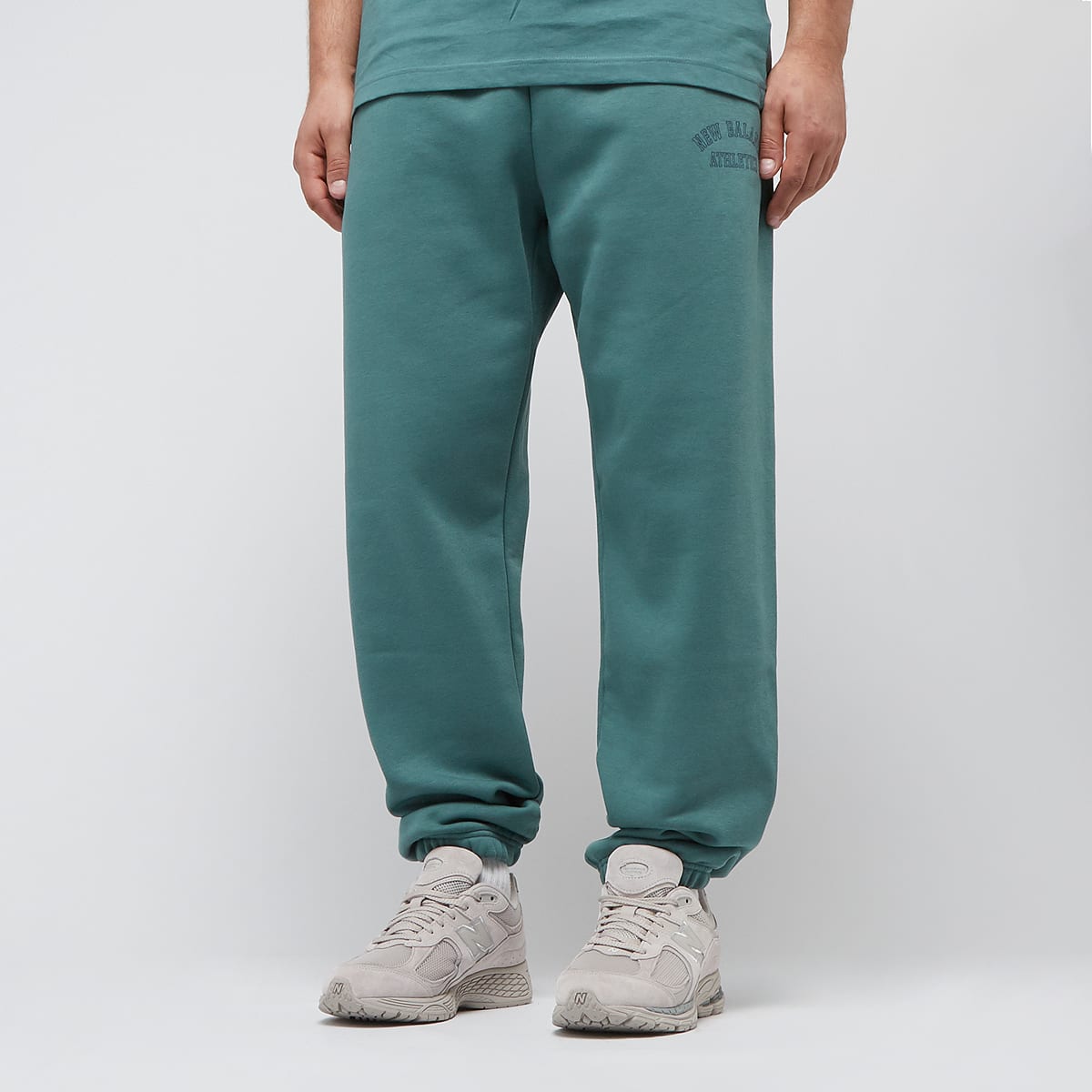 New Balance Sport Essentials Fleece Graphic Jogger Trainingsbroeken in groen formaten: XL