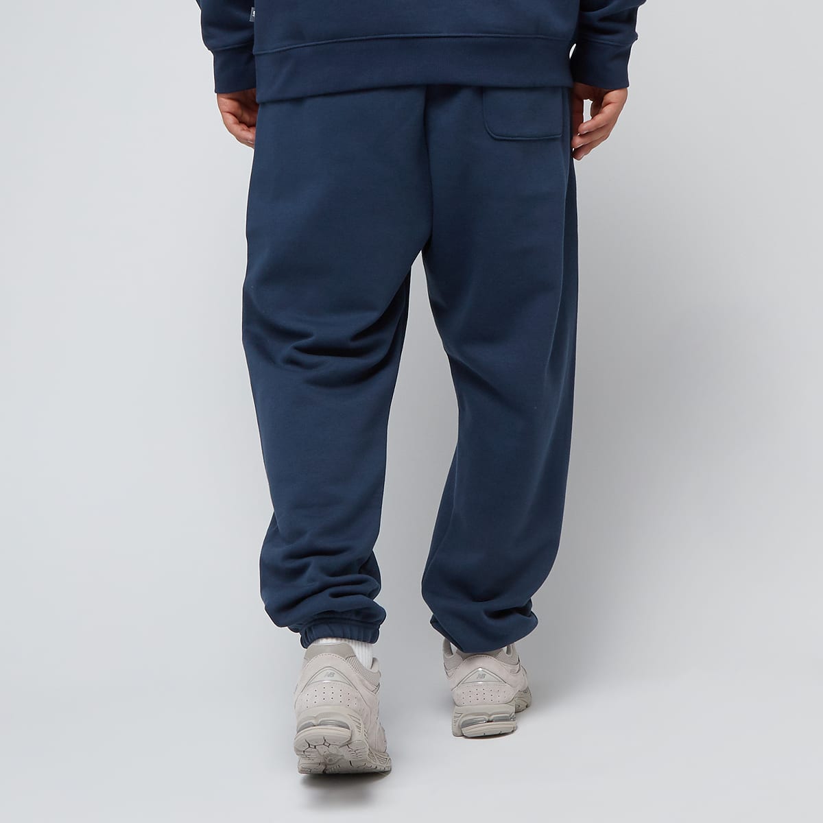 New Balance Sport Essentials Fleece Graphic Jogger Trainingsbroeken in blauw formaten: S