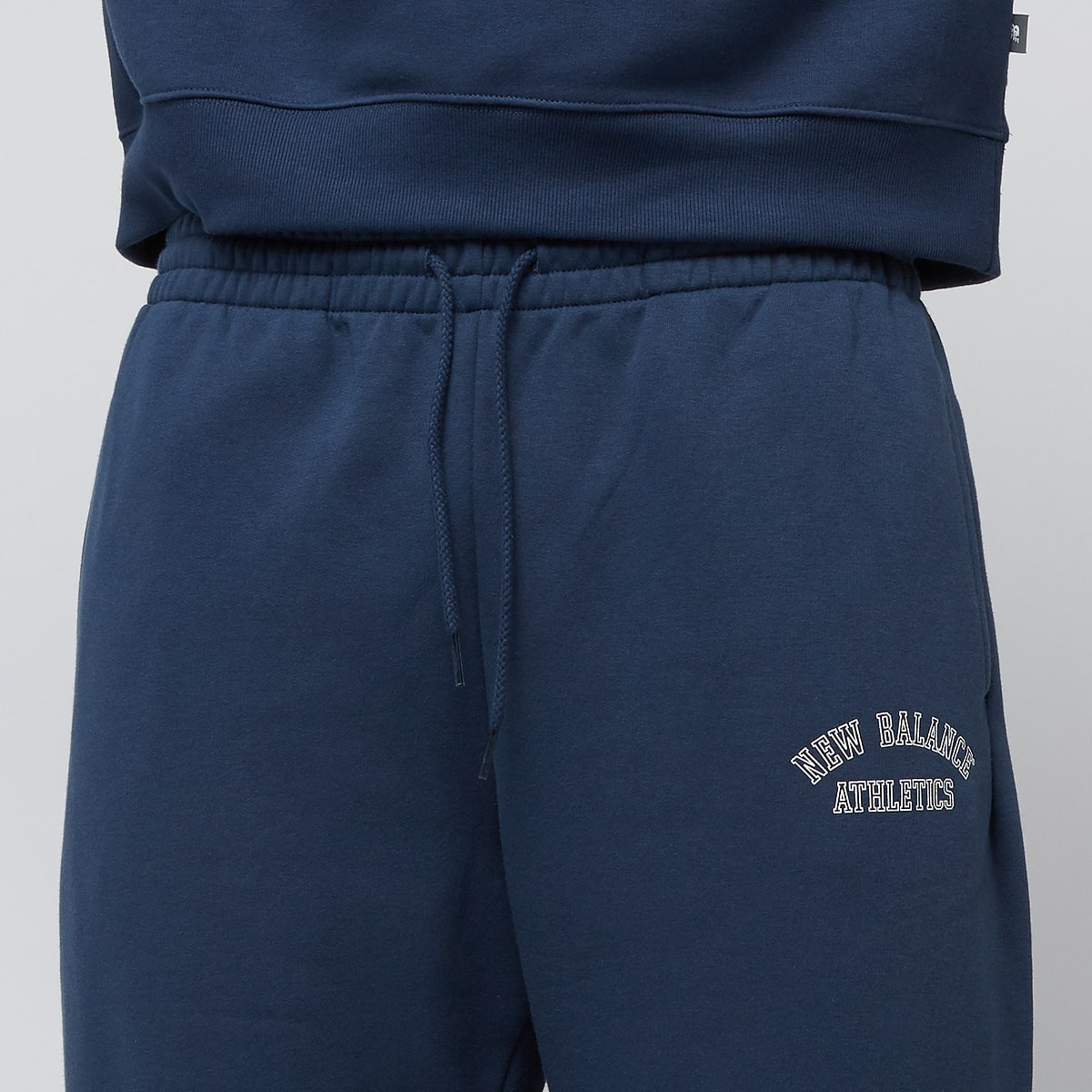 New Balance Sport Essentials Fleece Graphic Jogger Trainingsbroeken in blauw formaten: S