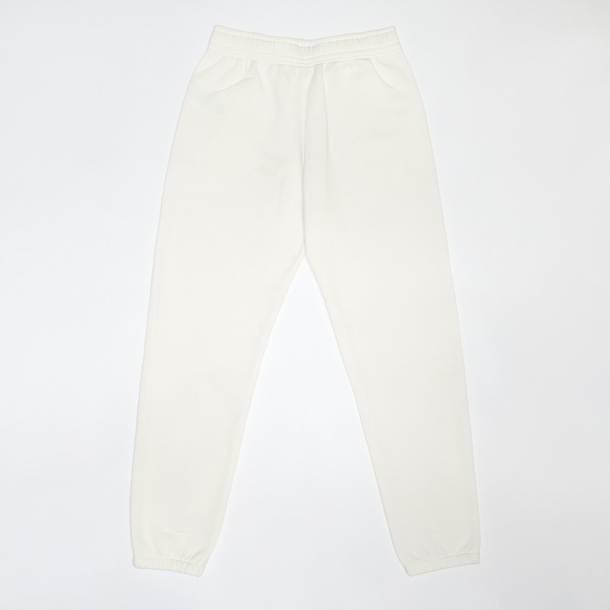Nike G NSW TREND FLC CF PANT sail moon fossil unisex Trainingsbroeken beige Kleding