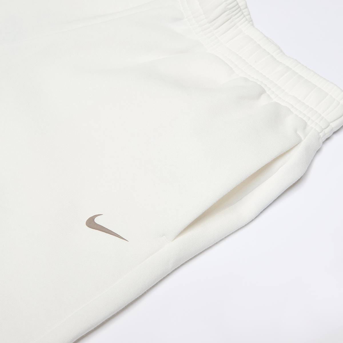 Nike G NSW TREND FLC CF PANT sail moon fossil unisex Trainingsbroeken beige Kleding
