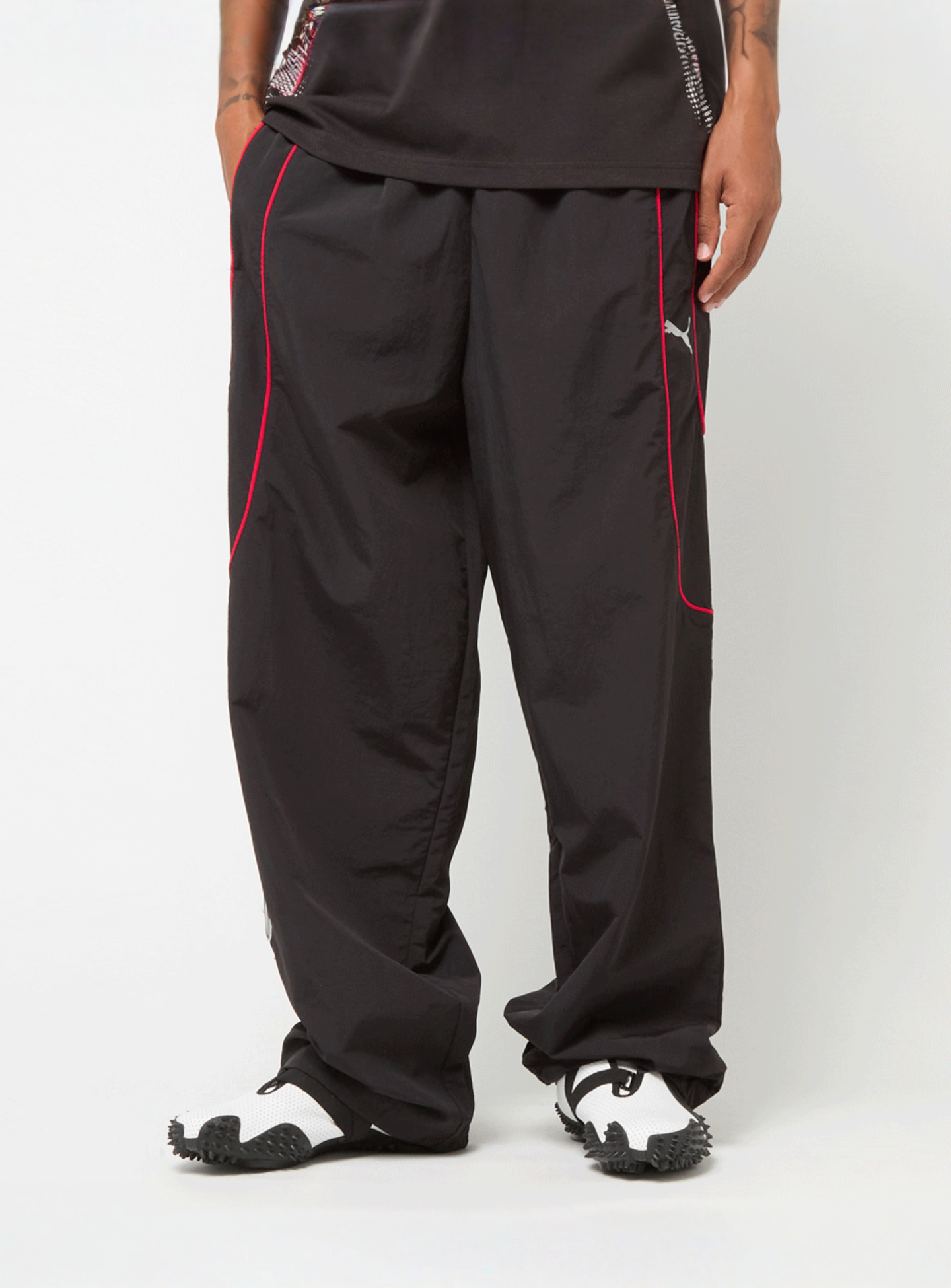 PUMA, PUMATECH-X Relaxed Track Pant Woven, black, Image 1 of 8