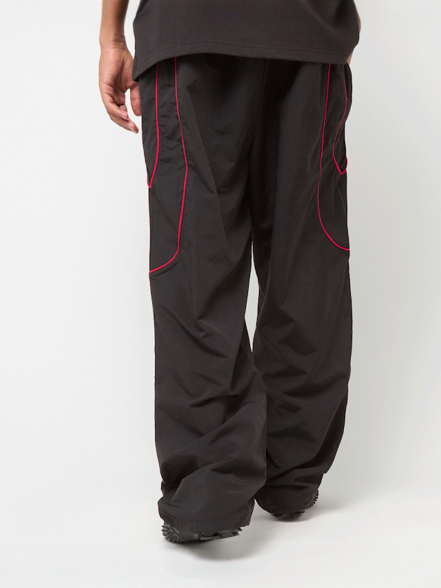 PUMA, PUMATECH-X Relaxed Track Pant Woven, black, Image 3 of 8