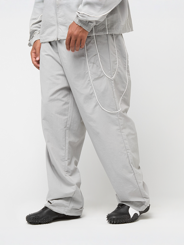 PUMA, Pumatech-X Relaxed Track Pant Woven, grey, Image 1 of 8