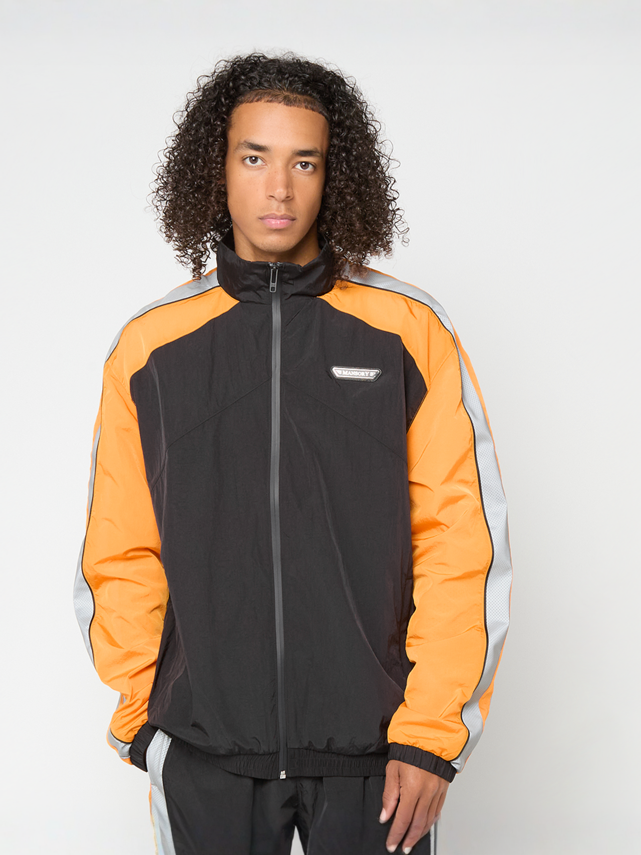 UA x Mansory Icon Track Jkt black / / black | SNIPES