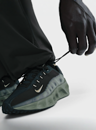 Nike, Tech Dri-FIT Woven Color-Block Oversized Pants, black, Image 4 of 6