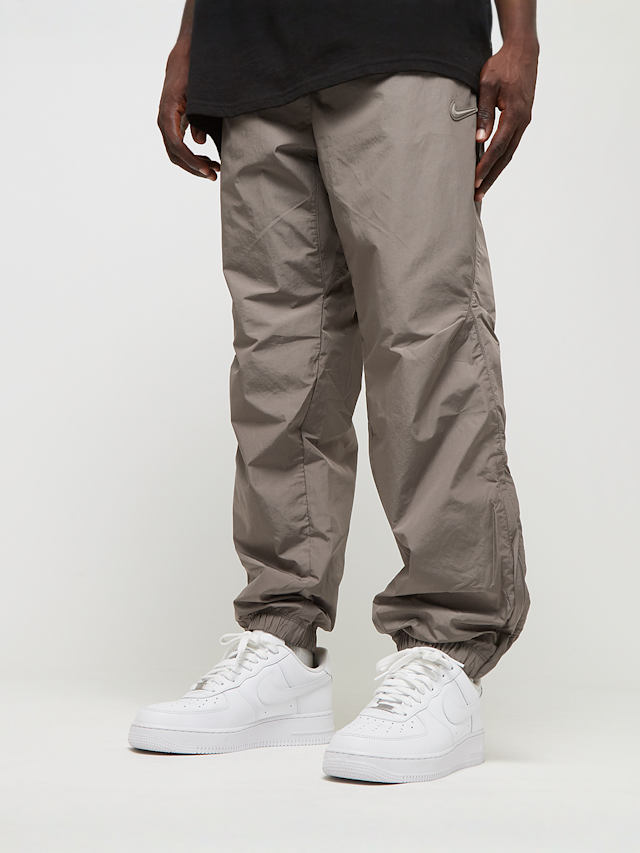 Nike Nocta, NRG Woven Track Pants, bruin, Afbeelding 1 van 7