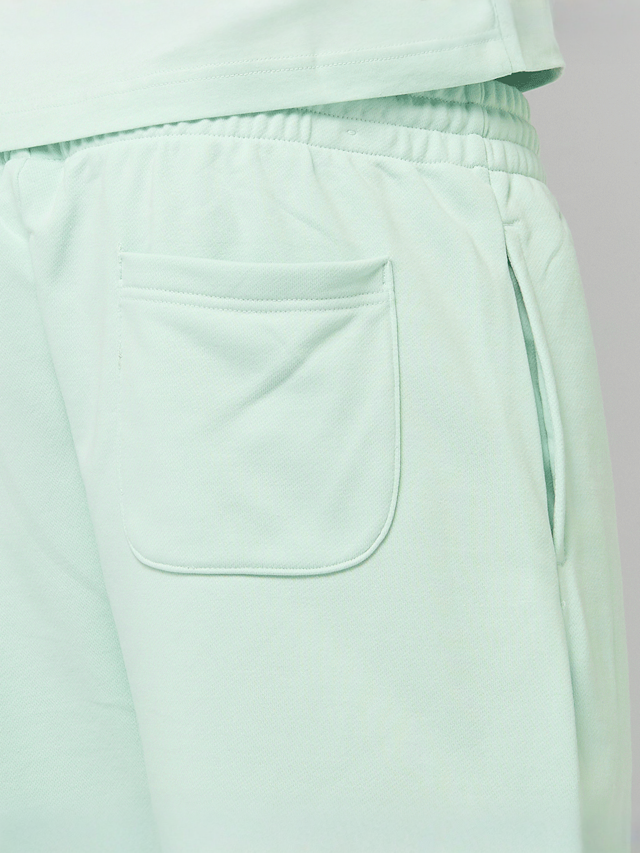 New Balance, Sport Essentials French Terry Short 7", zielony, Obraz 3 z 5